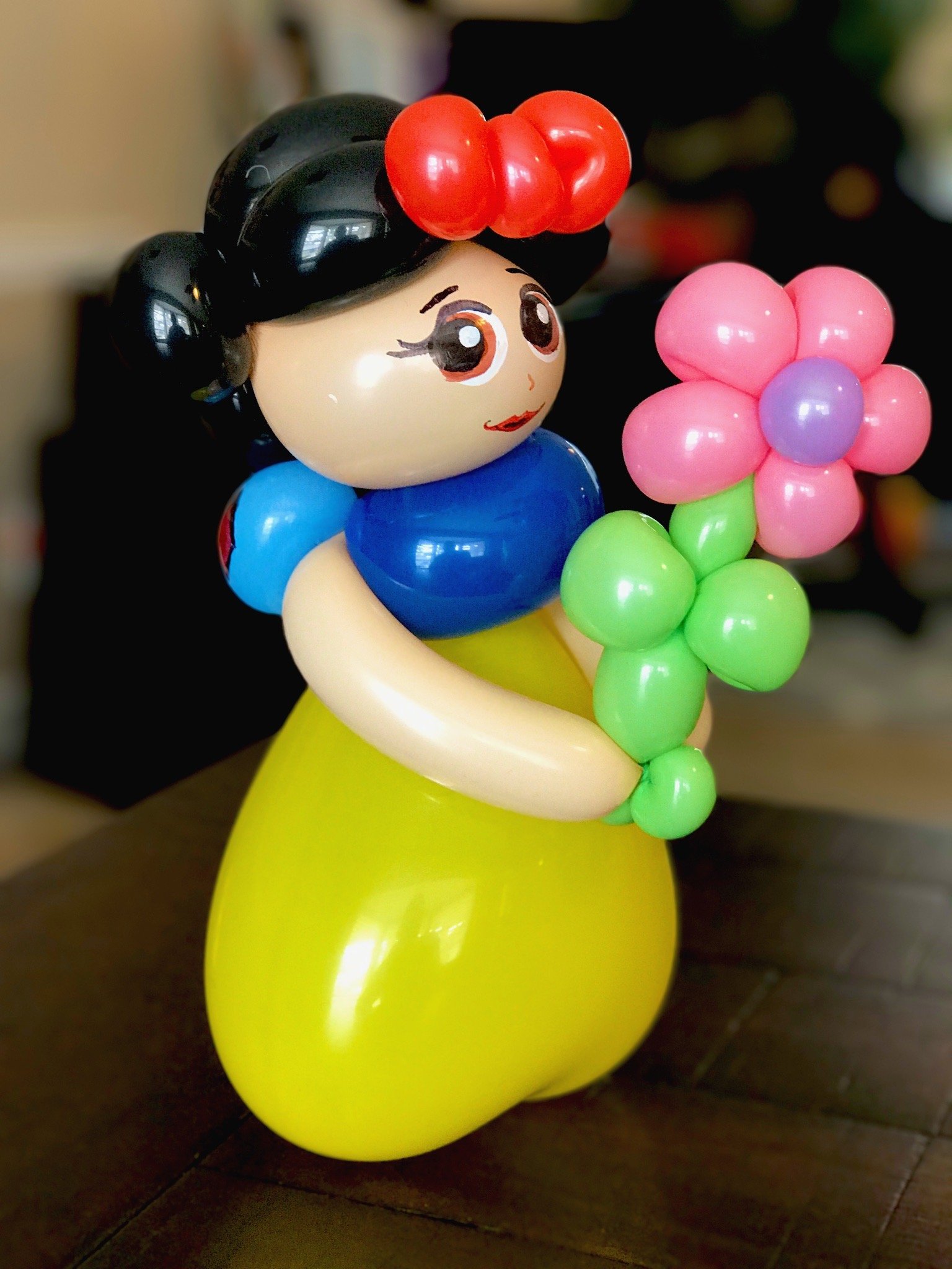 Custom balloon sculpture creation by Ed Kevorkian at a Florida event