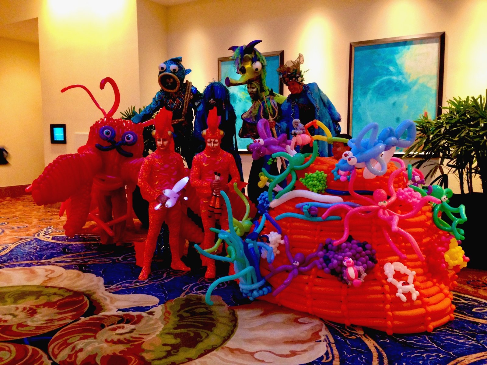 Audience reacting to a magician card trick at an event