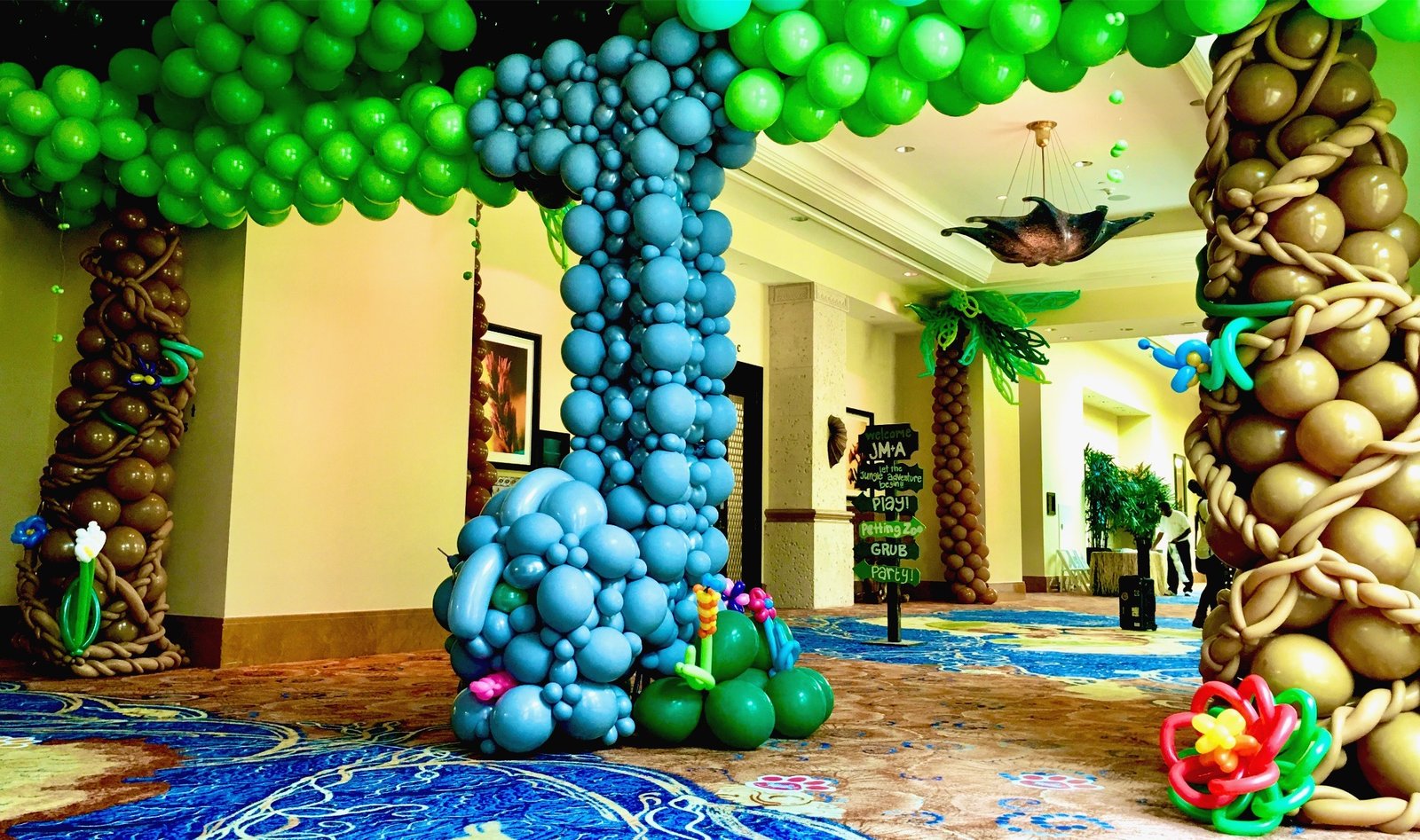 Large-scale balloon sculpture display at venue entrance