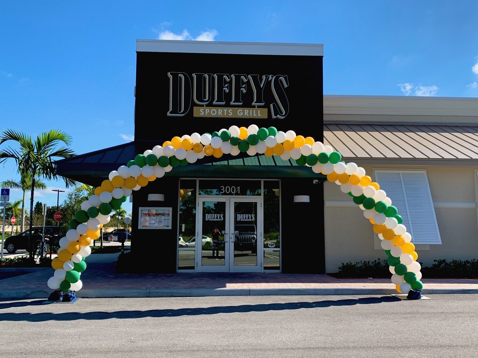 Sales venue with eye-catching balloon decor and entertainment